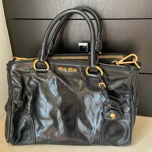 Miu Miu distressed leather satchel